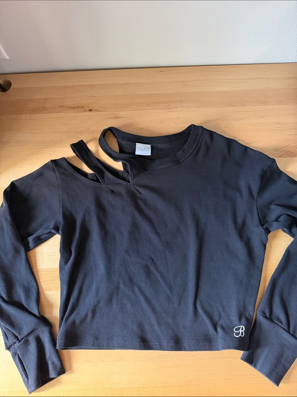 Black Long-Sleeve Cutout Top with Logo
